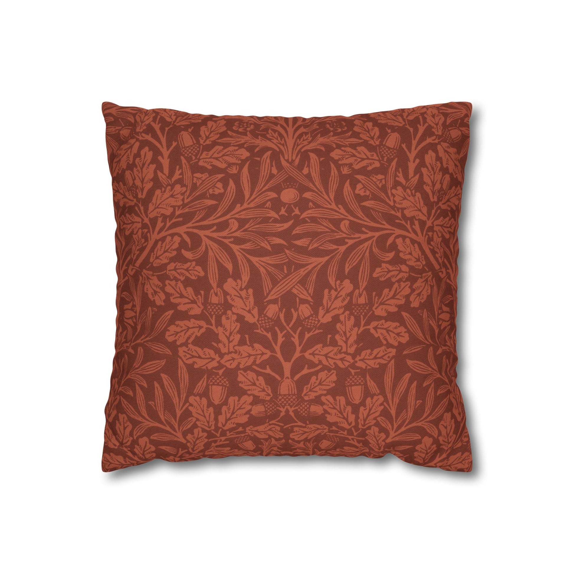 Red floral patterned pillow on a white background