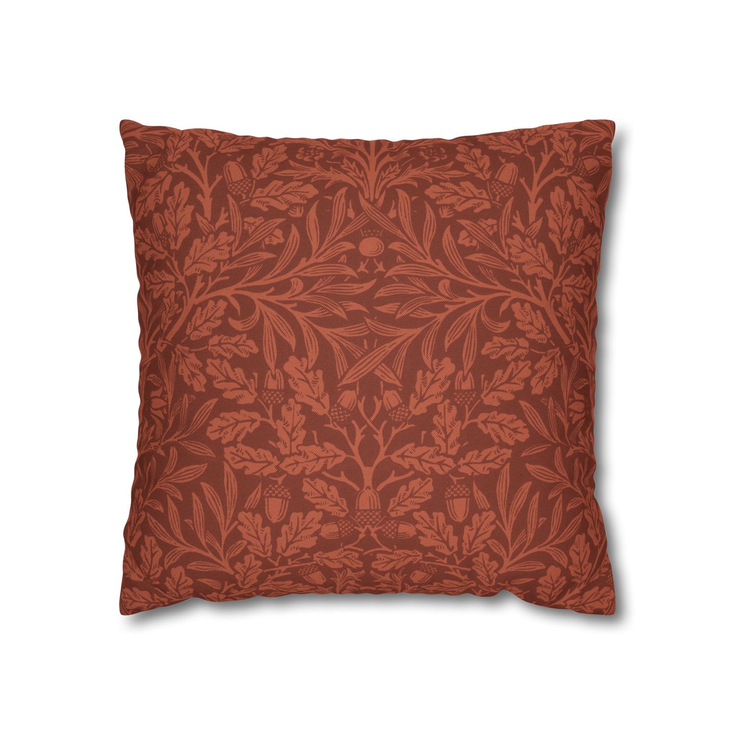 Decorative pillow with a red leaf pattern on a white background