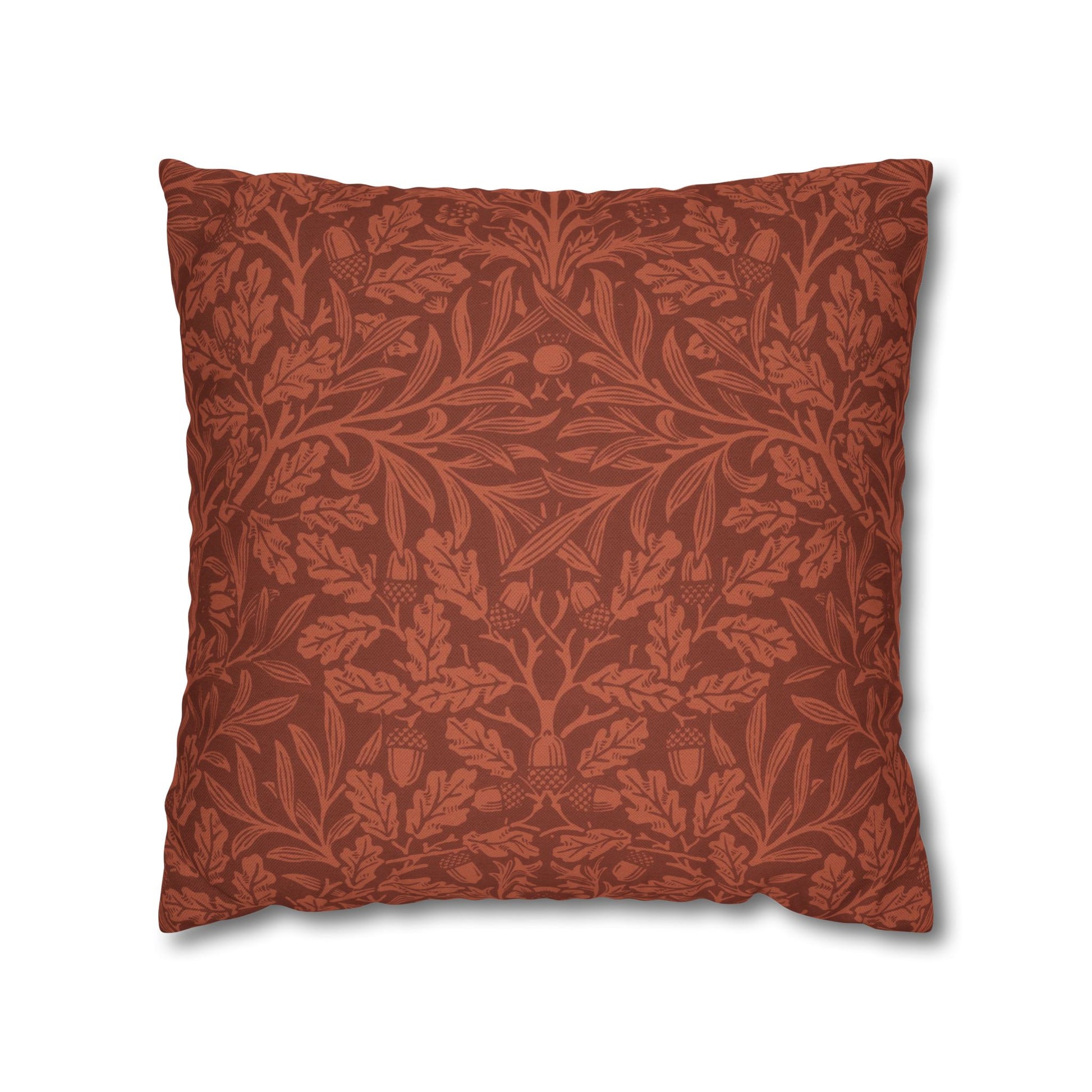 Red patterned pillow on a white background