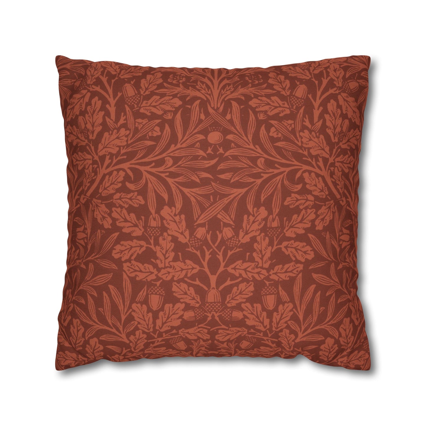 Decorative pillow with intricate leaf pattern on a white background