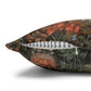 Decorative pillow with a floral pattern on a white background