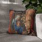 Decorative pillow with religious design on a gray sofa
