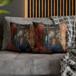 Decorative pillows with religious-themed designs on a gray sofa.