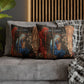 Decorative pillows with religious-themed designs on a gray sofa.