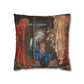 Decorative pillow with religious scene featuring a woman holding a child, surrounded by figures and floral elements.