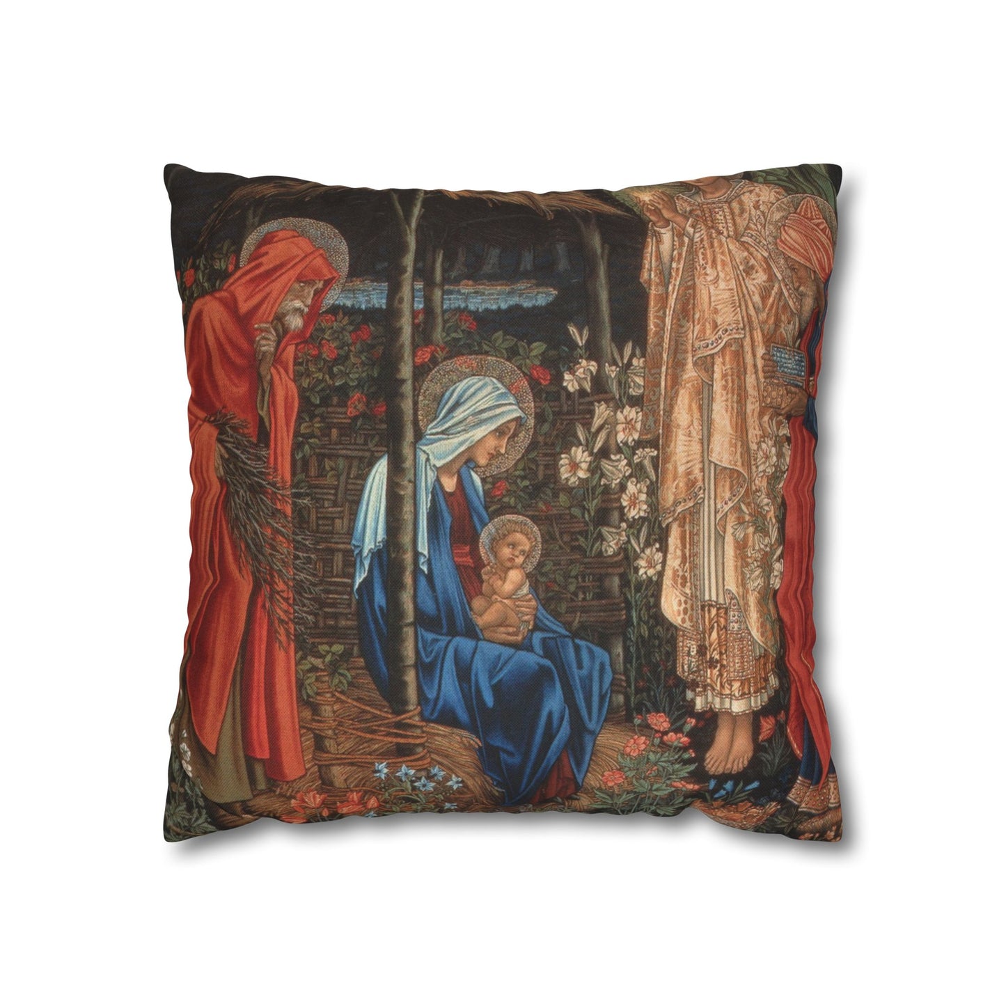 Decorative pillow with religious scene featuring a woman holding a child, surrounded by figures and floral elements.