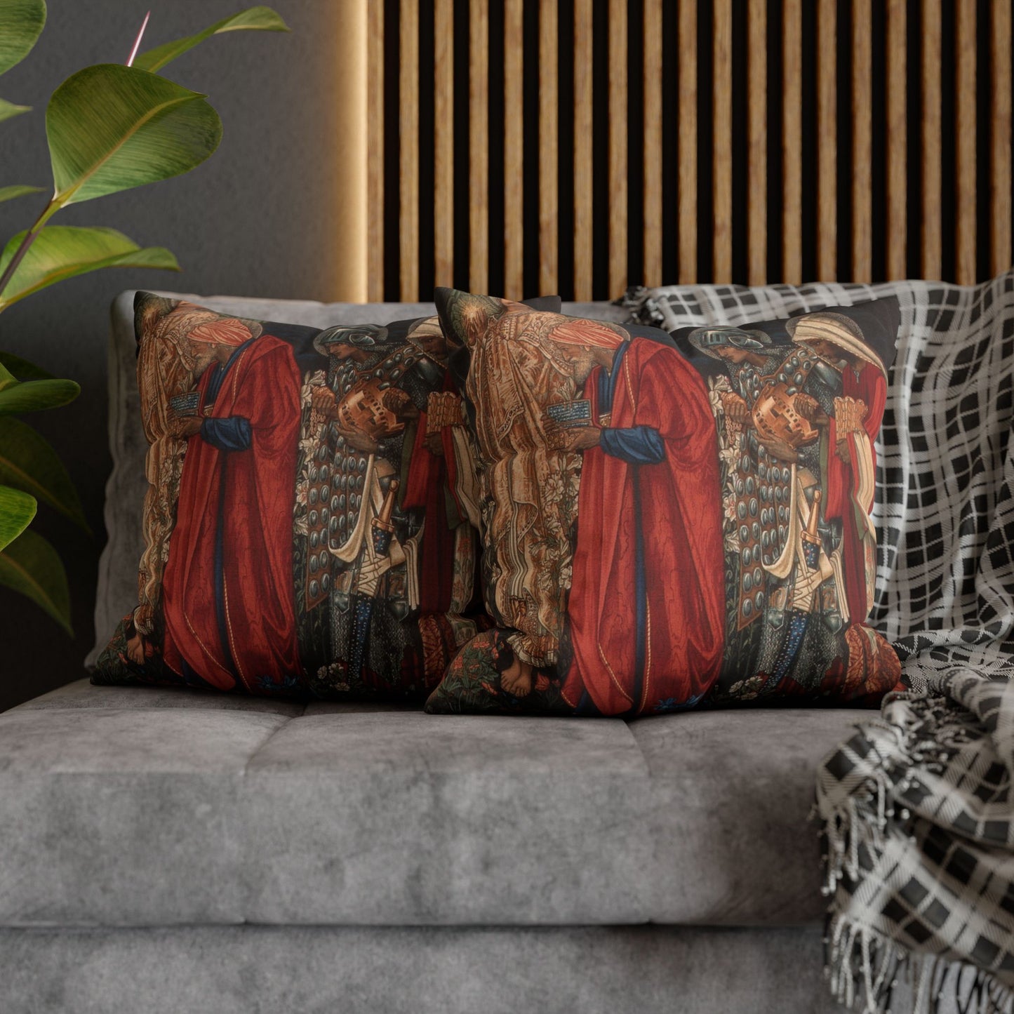 Decorative pillows with artistic designs on a gray sofa