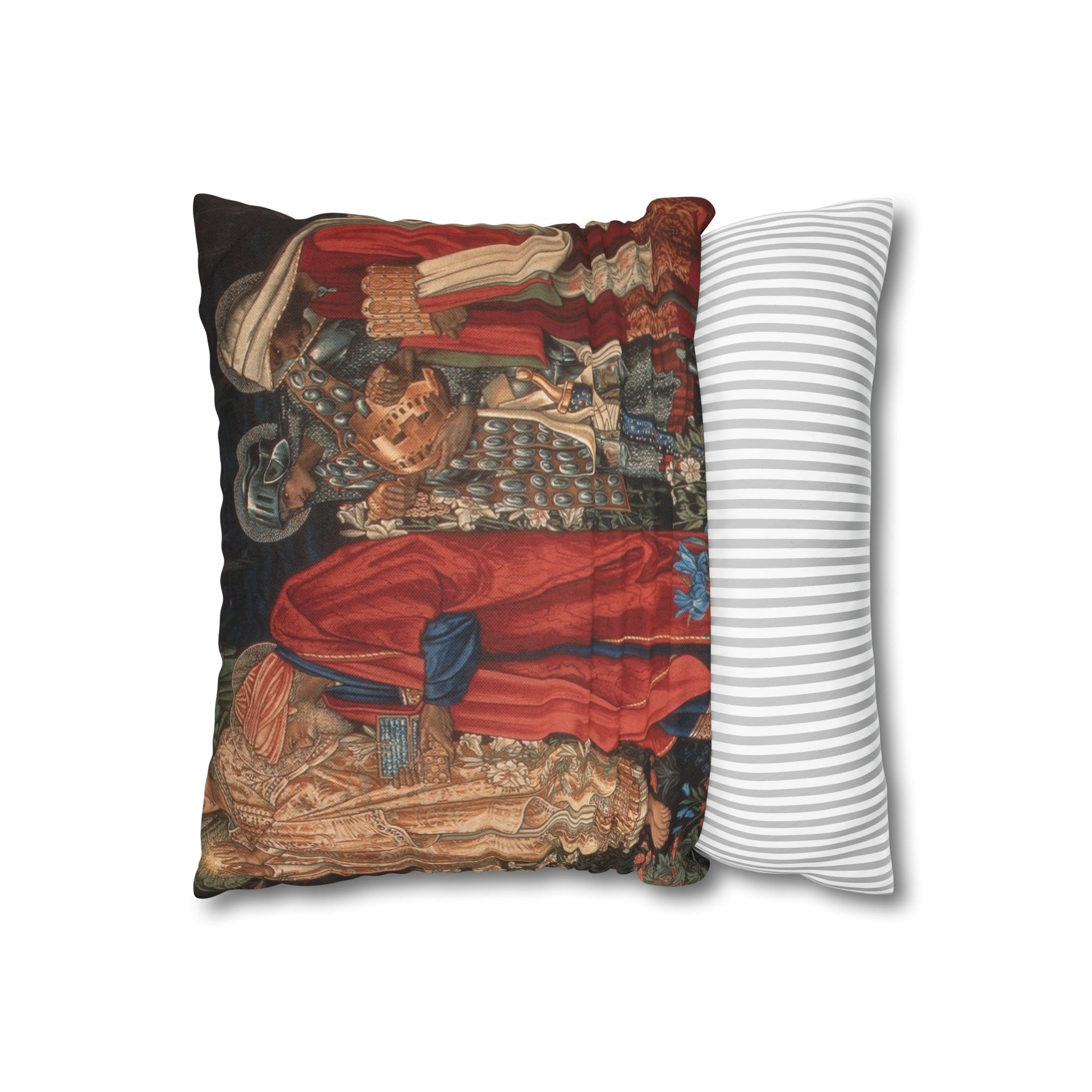 Decorative pillow with intricate design on one side and a plain white and gray striped pattern on the other side.