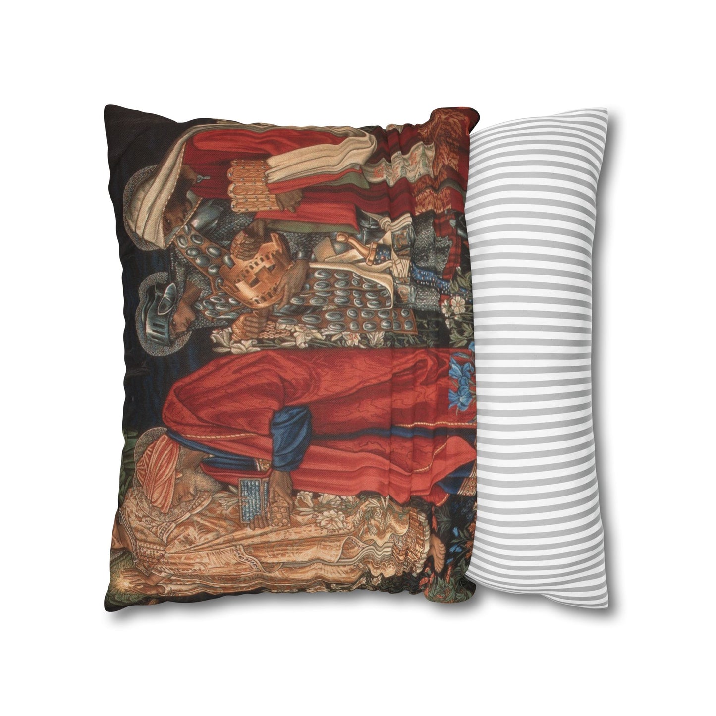 Decorative pillow with intricate design next to a striped pillow on a white background