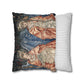 Decorative pillow with classical art design next to a striped pillow on a white background