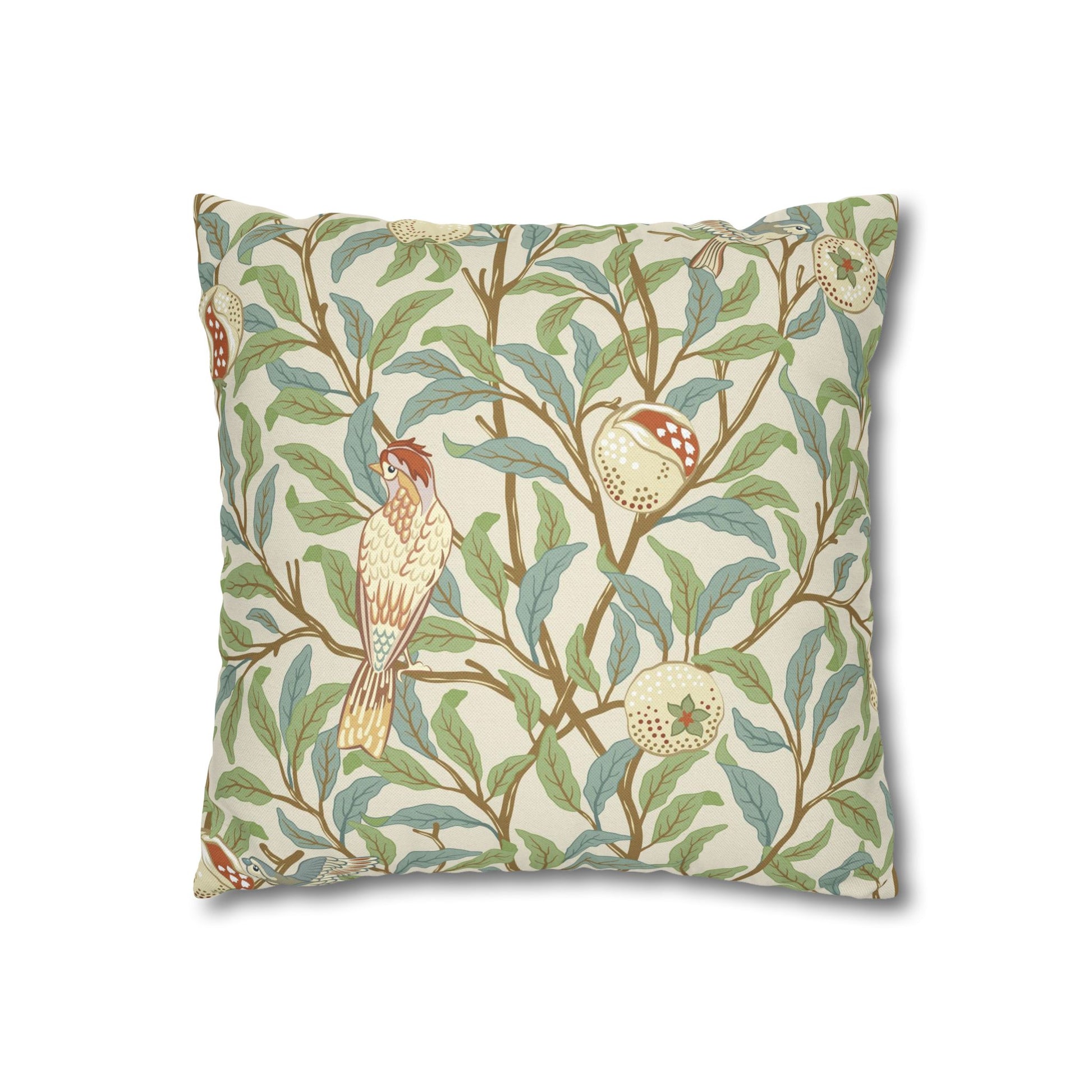 Decorative pillow with bird and leaf pattern on a white background