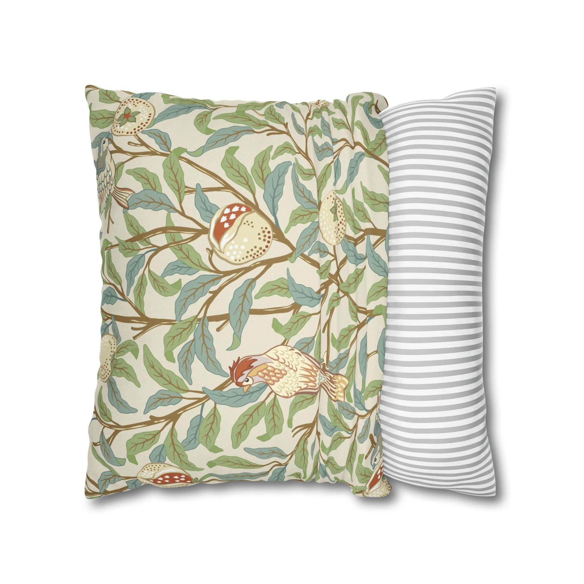 Two pillows, one with nature-themed design and the other with striped pattern, on a white background.