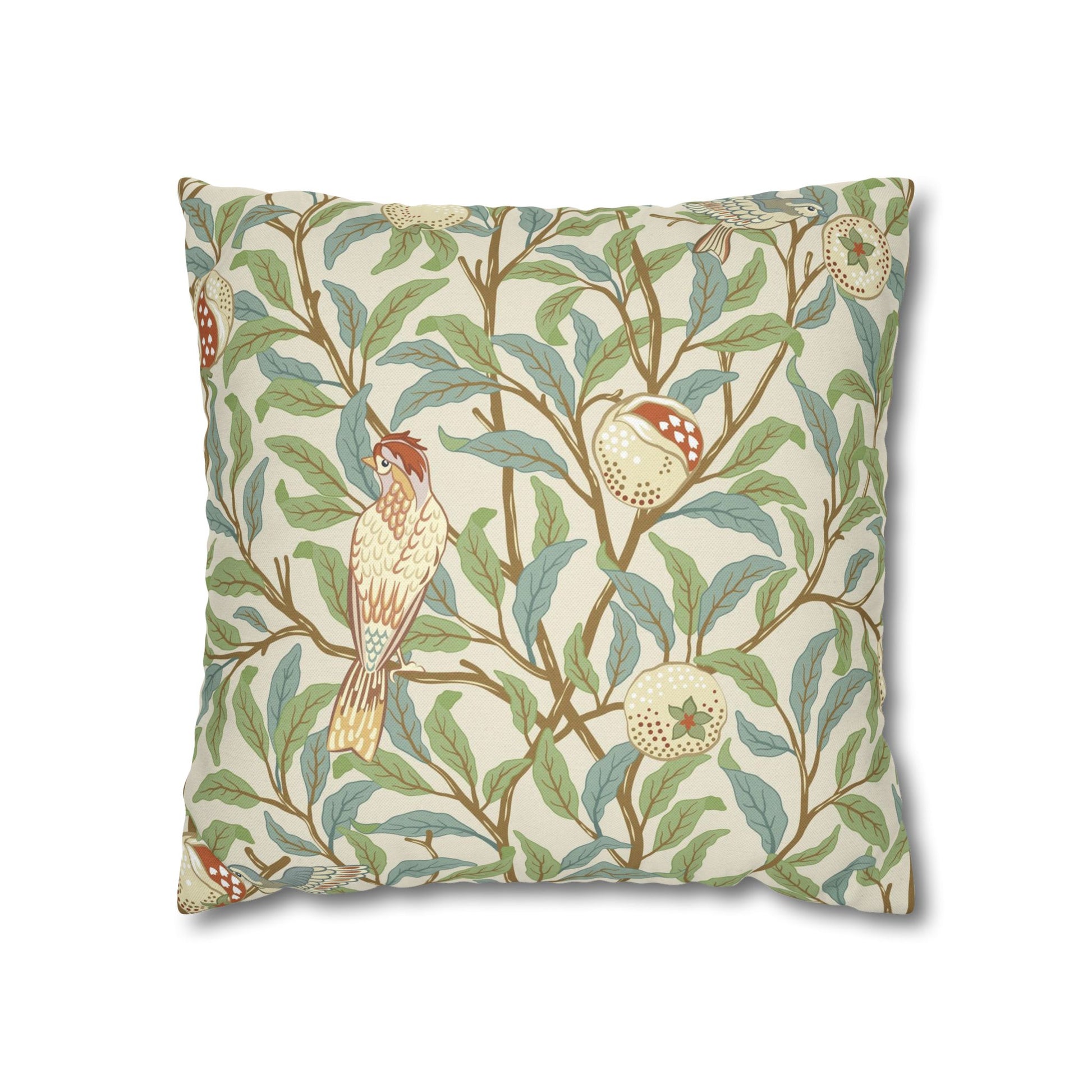 Decorative pillow with bird and leaf pattern on a white background