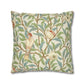 Decorative pillow with bird and floral pattern on a white background