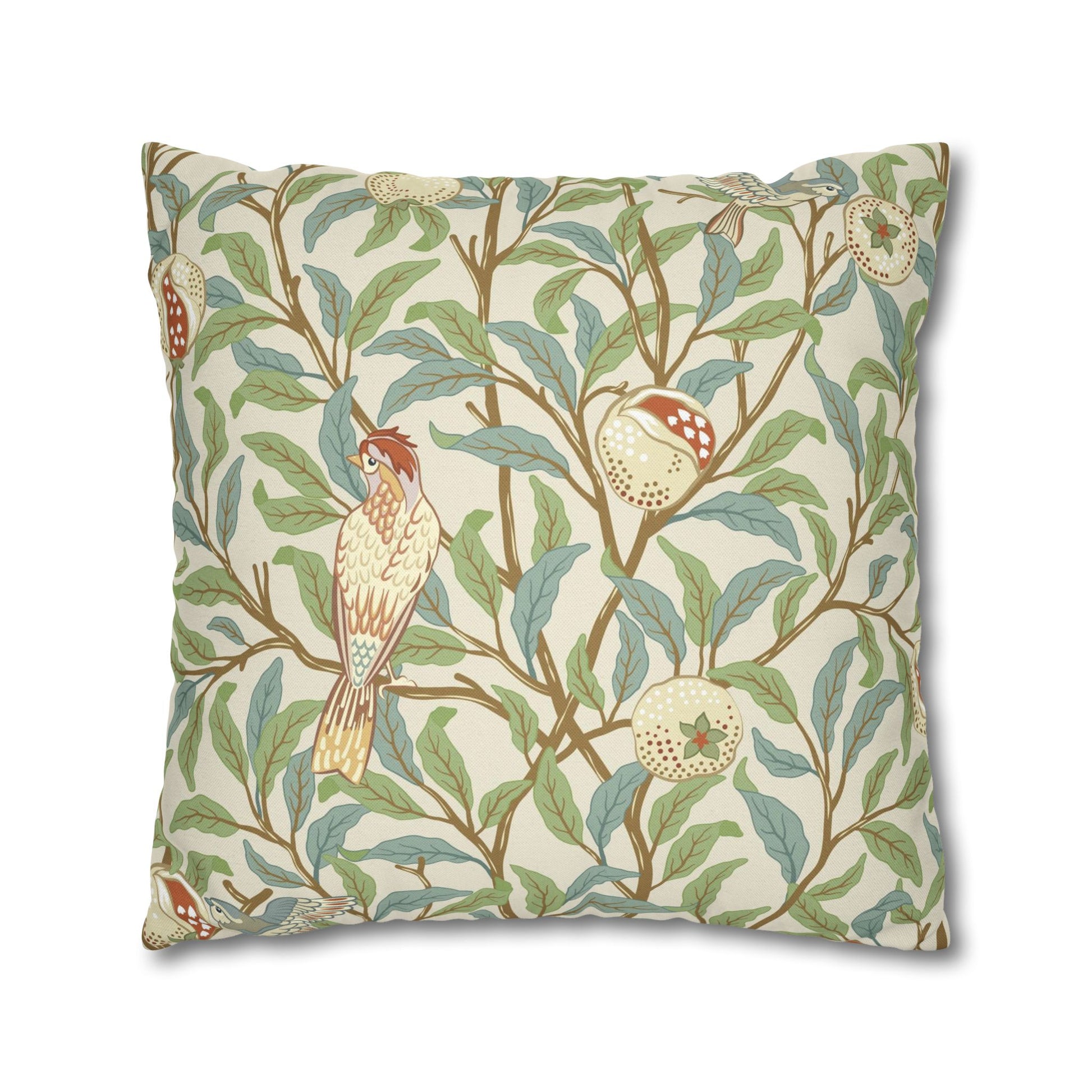 Decorative pillow with bird and floral pattern on a white background