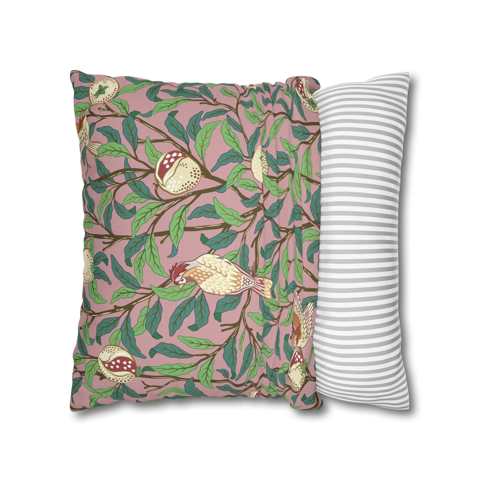 Two pillows, one with a floral pattern and the other with a striped pattern, on a white background.