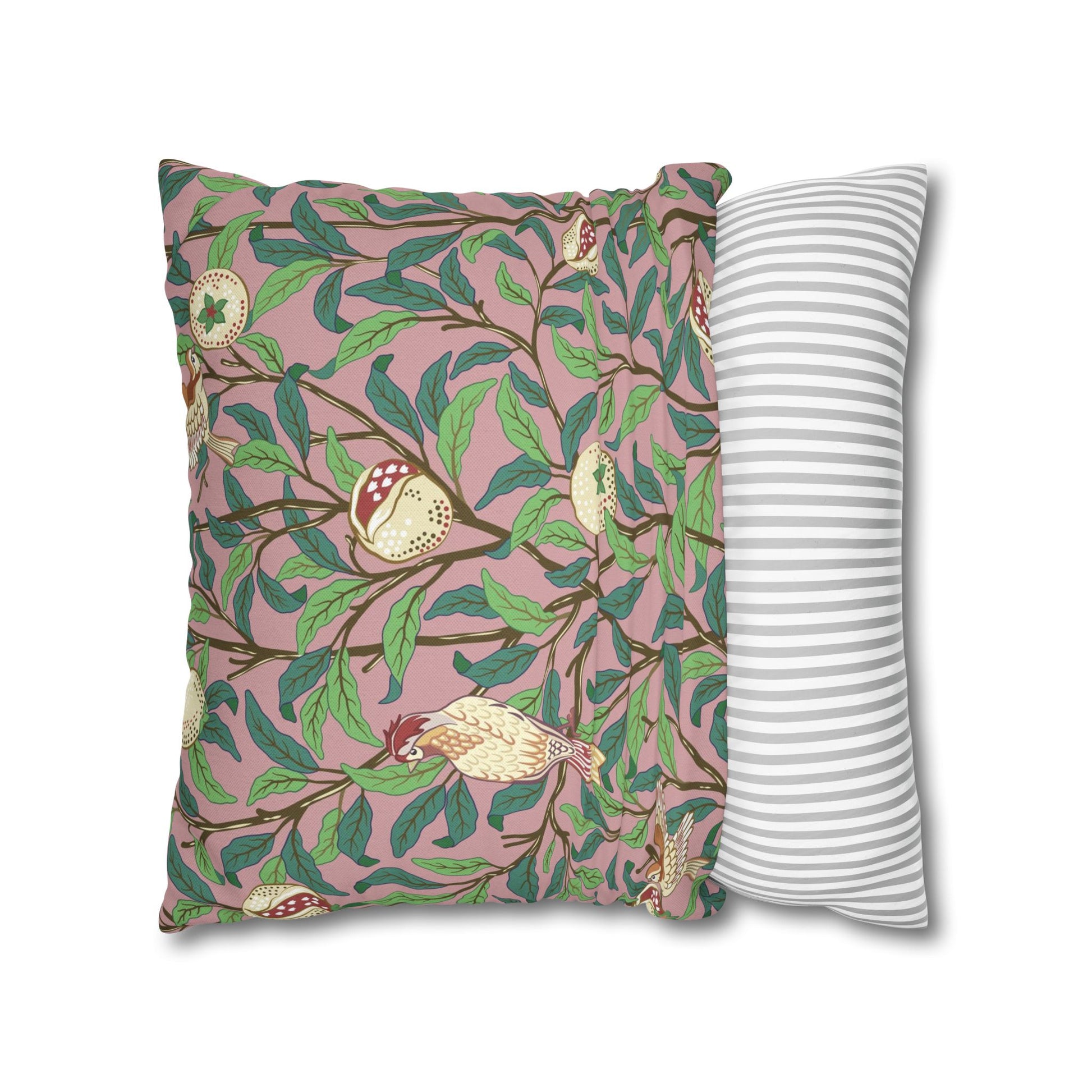 Two pillows, one with a floral pattern and the other with a striped pattern, on a white background.