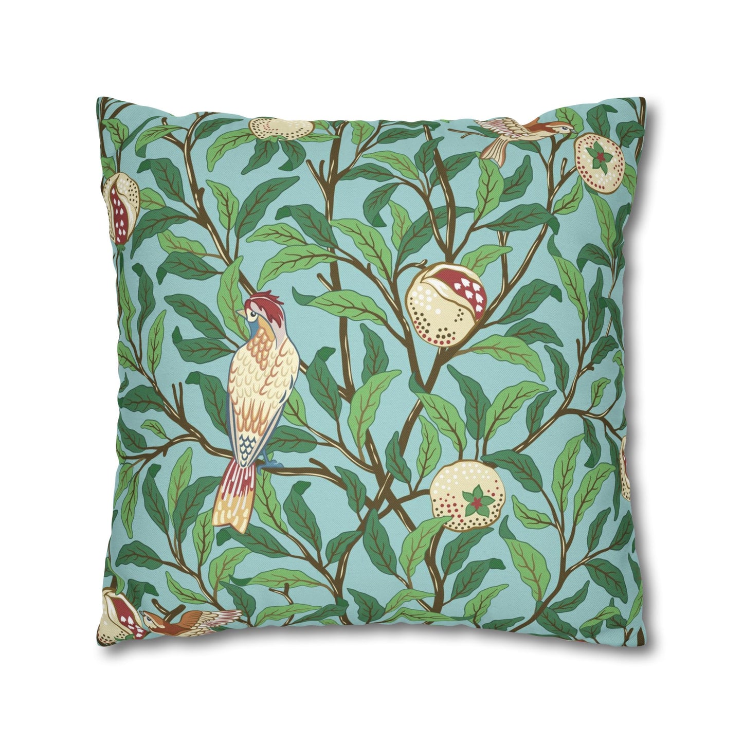 Decorative pillow with bird and floral pattern on a light blue background