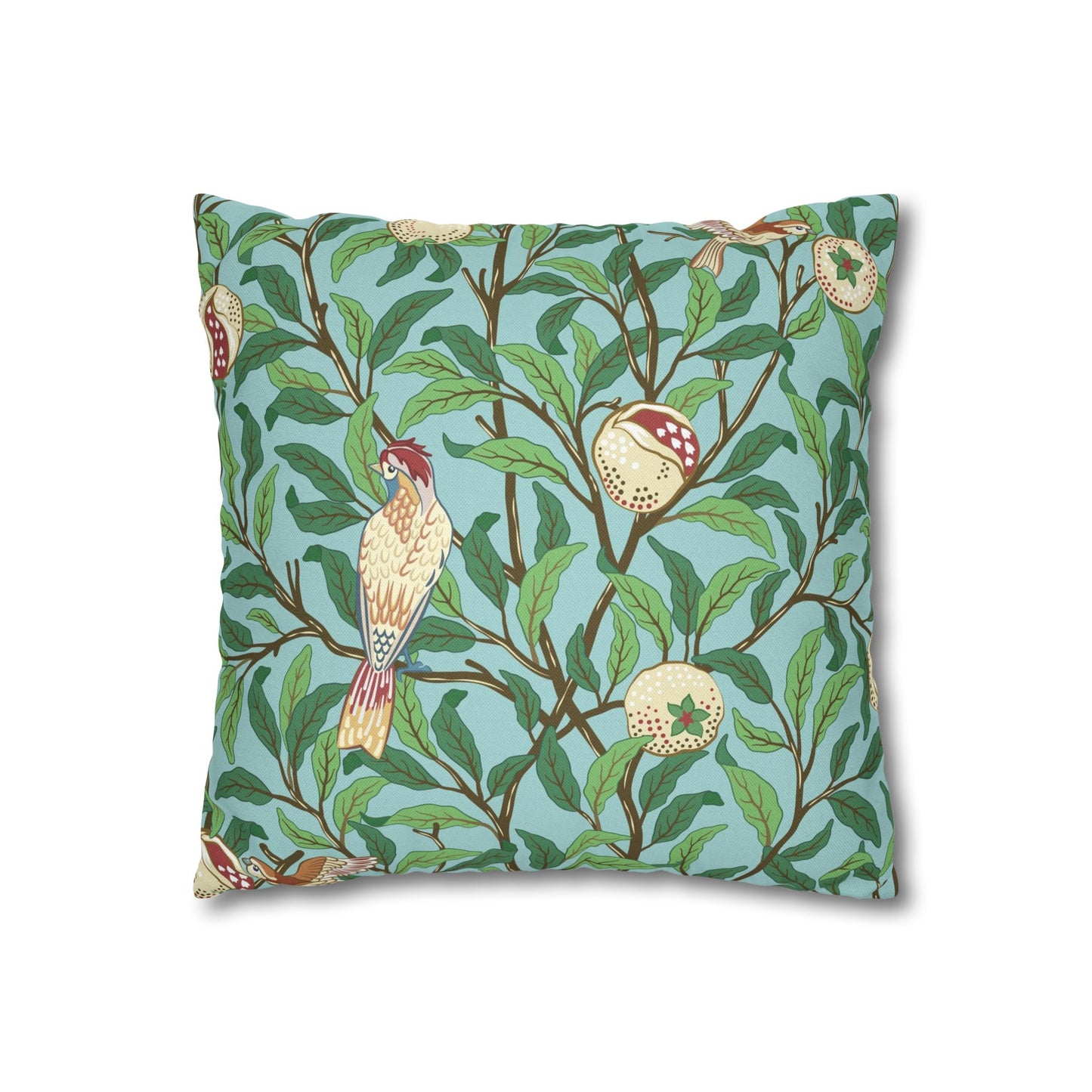 Decorative pillow with bird and leaf pattern on a blue background