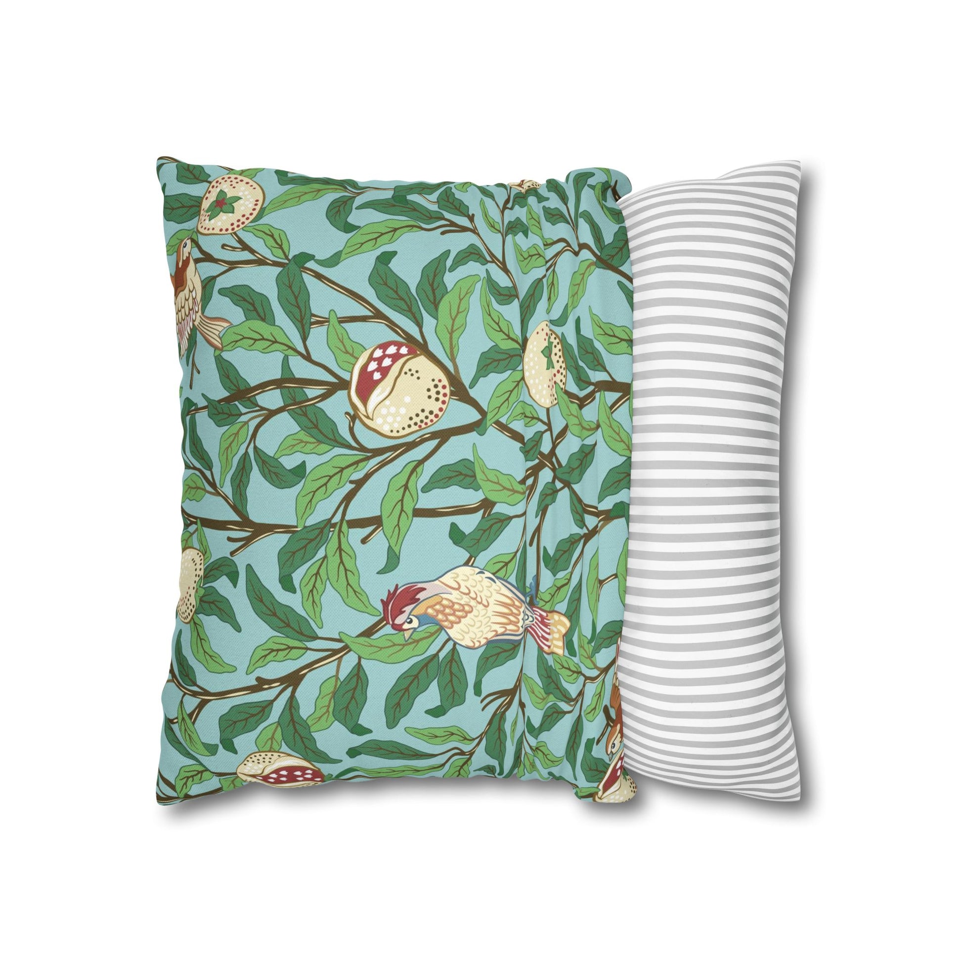 Two pillows, one with a nature-themed design and the other with a striped pattern, on a white background.