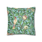 Decorative pillow with bird and nest pattern on a blue background