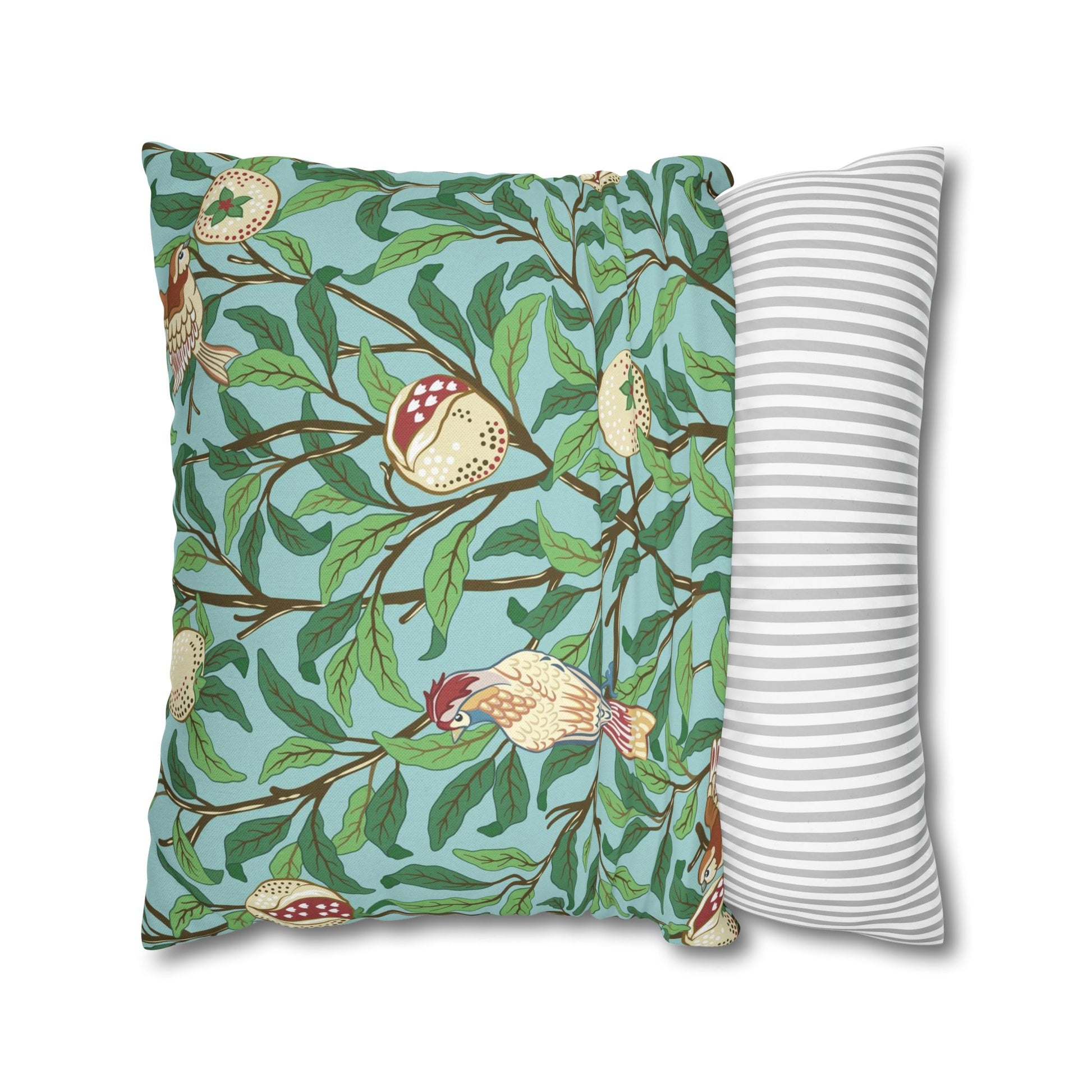 Two pillows, one with a nature-themed design and the other with a striped pattern, on a white background.