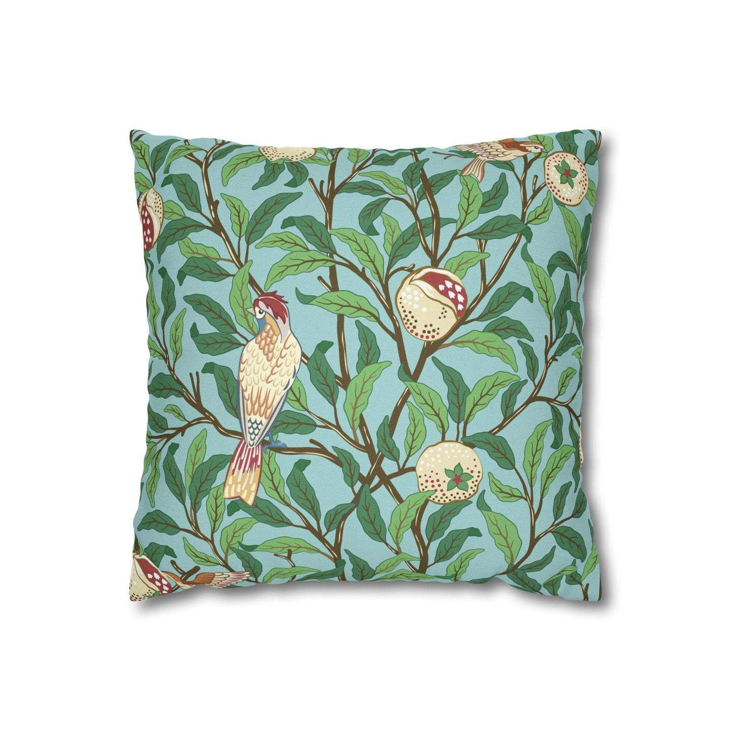 Decorative pillow with bird and floral pattern on a light blue background