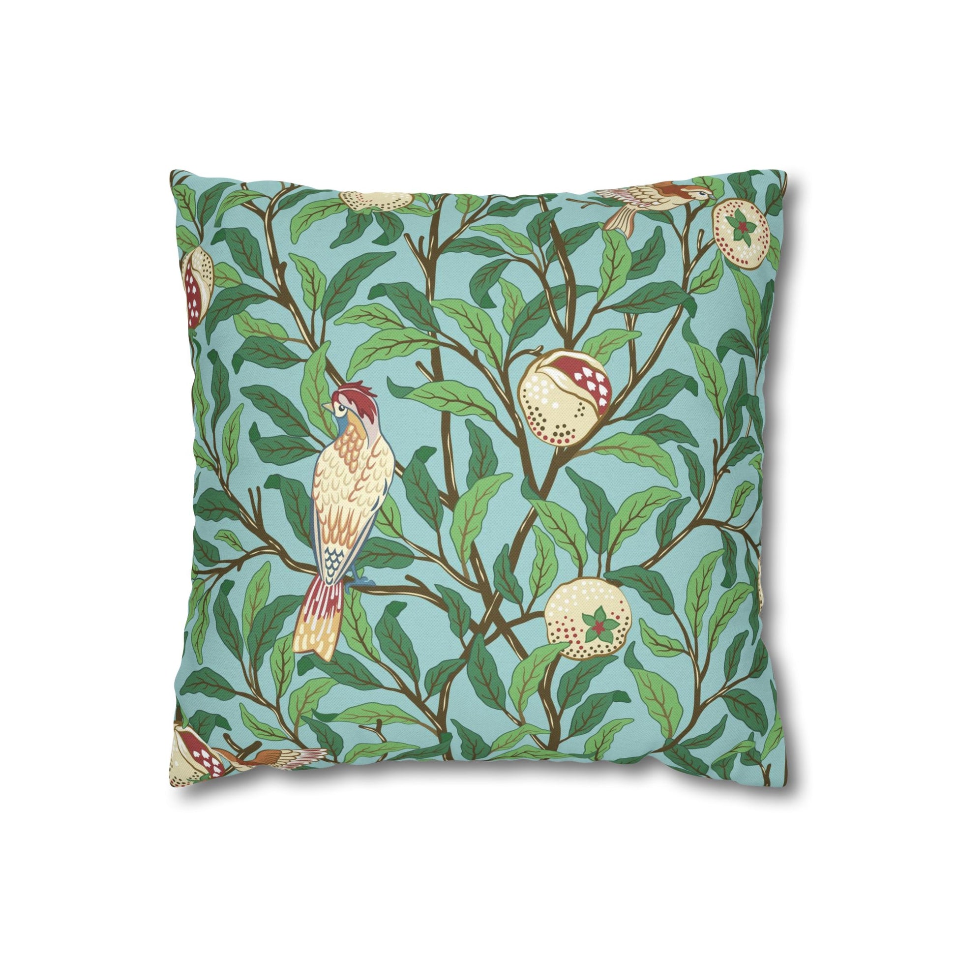 Decorative pillow with bird and floral pattern on a light blue background