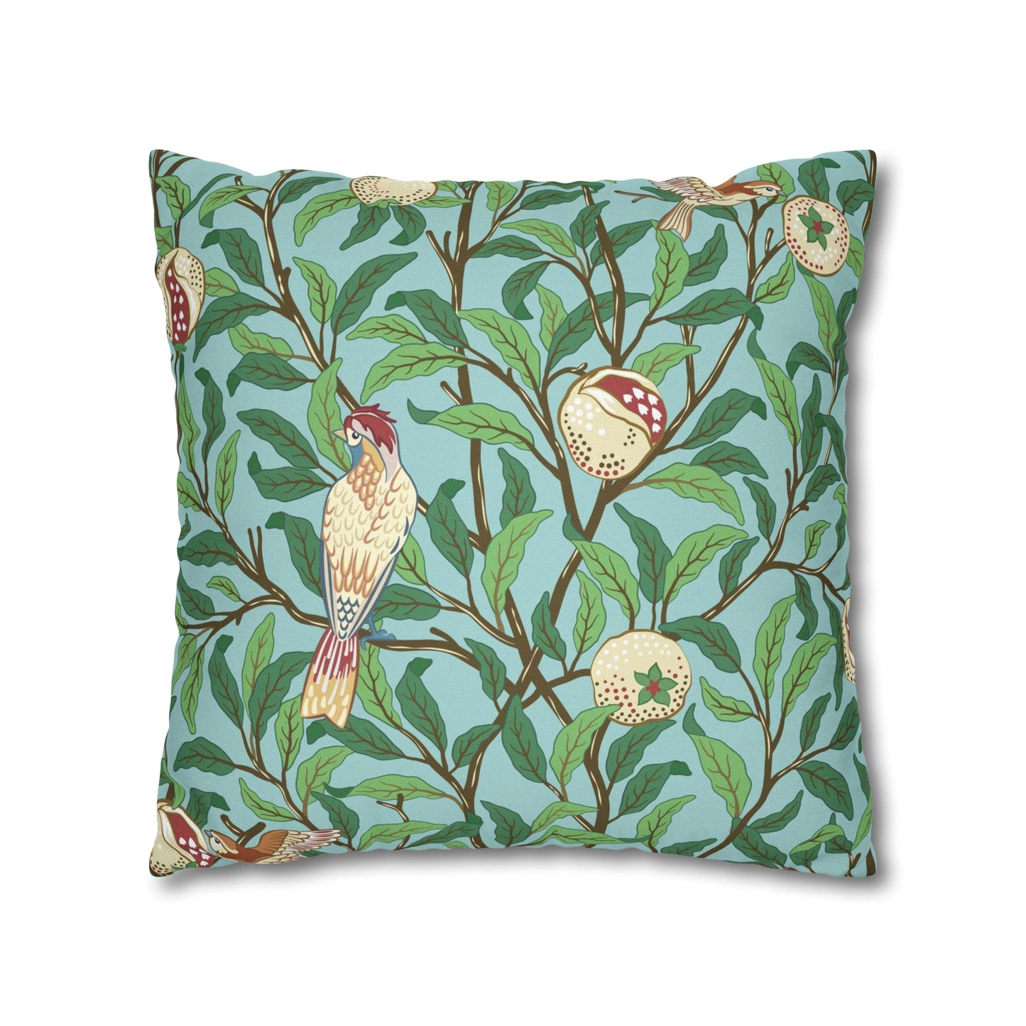 Decorative pillow with bird and leaf pattern on a blue background