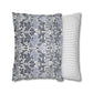 Two pillows, one with a floral pattern and the other with a striped pattern, on a white background.
