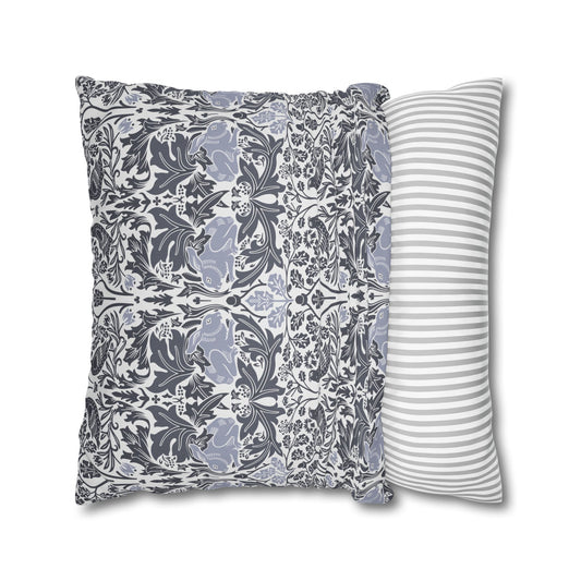 Two pillows, one with a floral pattern and the other with a striped pattern, on a white background.