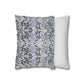 Two pillows, one with floral pattern and one with stripes, on a white background