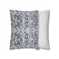 Two pillows, one with a floral pattern and the other with a striped pattern, on a white background.