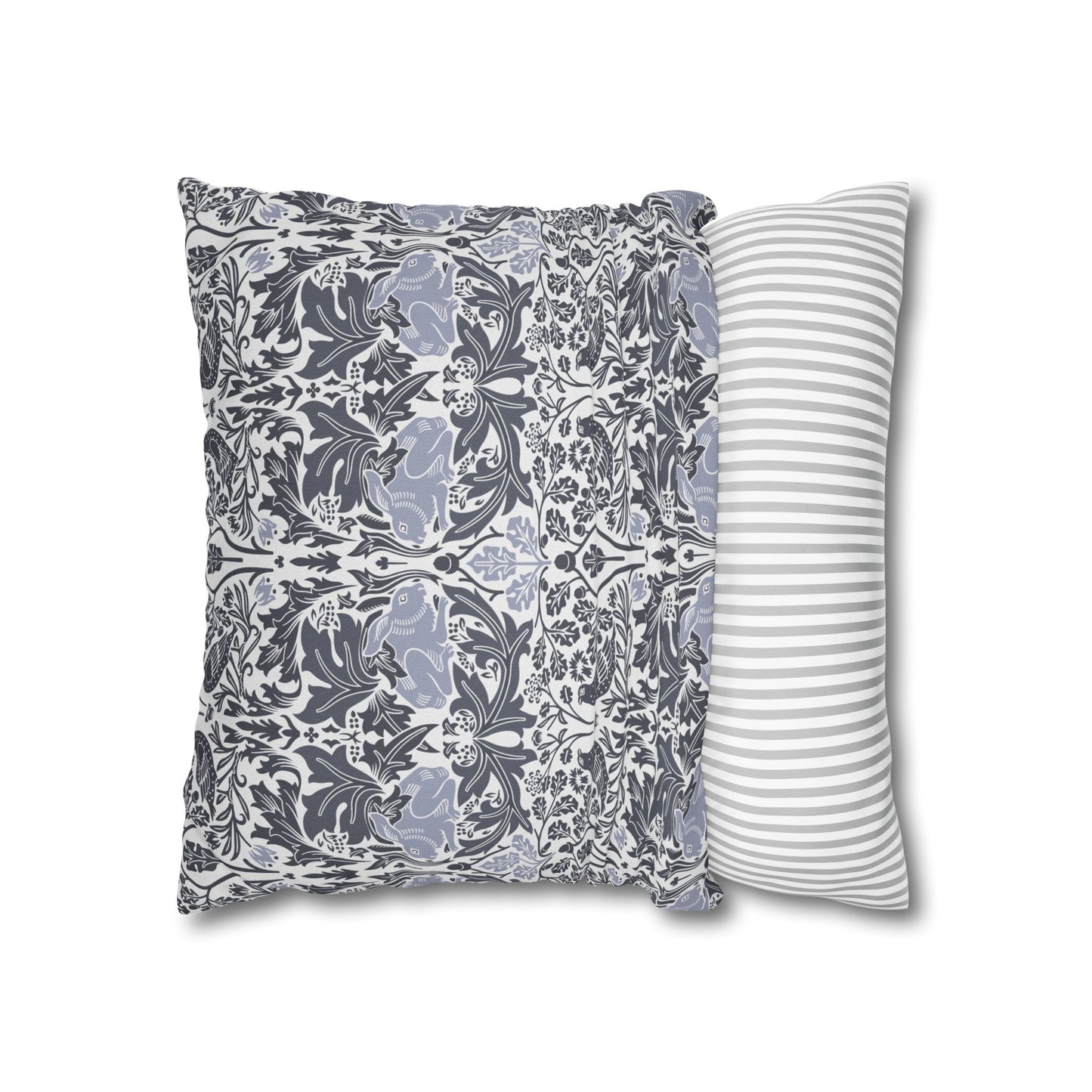 Two pillows, one with a floral pattern and the other with a striped pattern, on a white background.