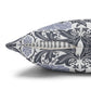 Decorative pillow with a blue and white pattern on a white background