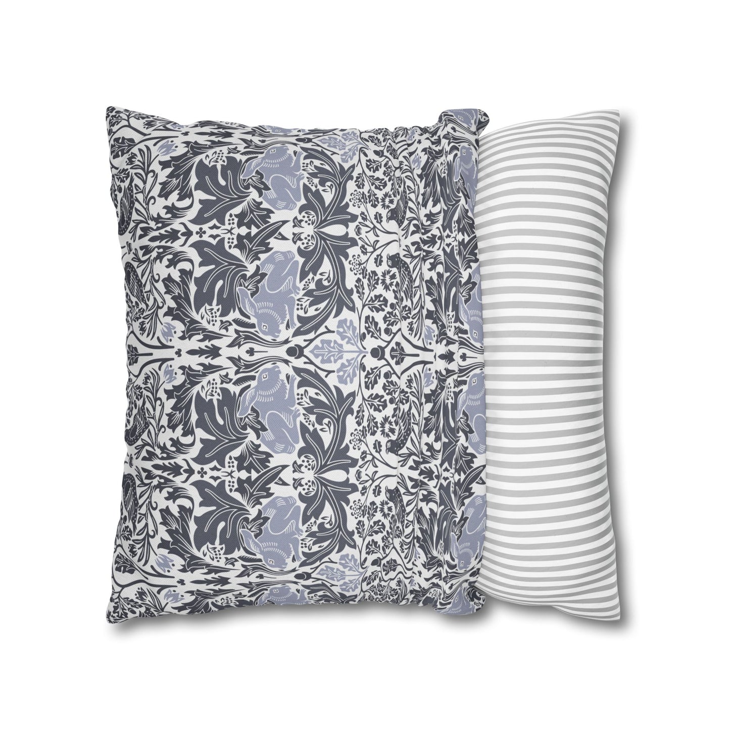Two pillows, one with a floral pattern and the other with a striped pattern, on a white background.
