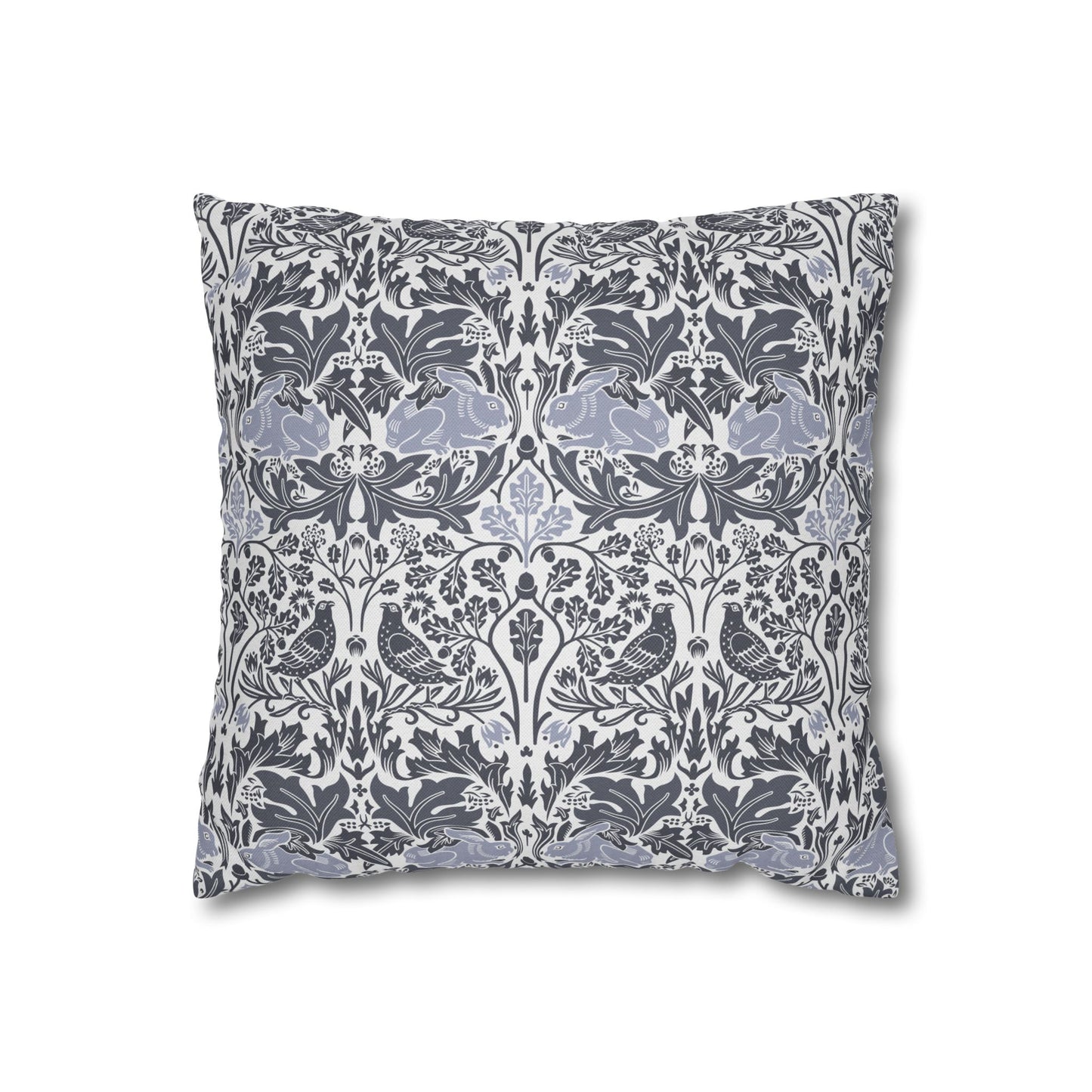 Decorative pillow with floral and bird pattern on a white background