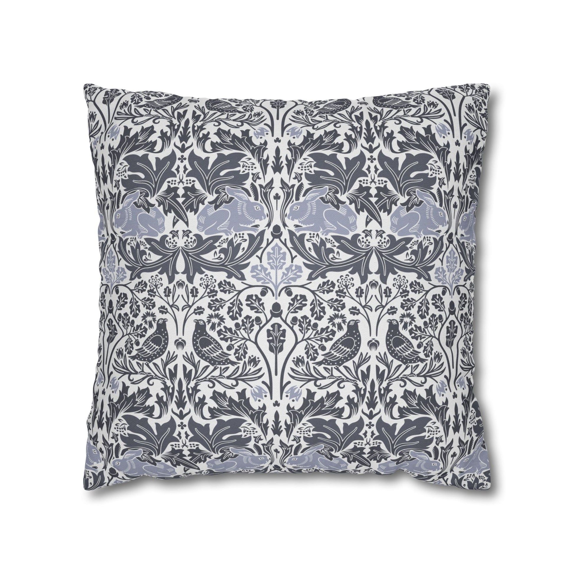 Decorative pillow with floral and animal pattern on a white background