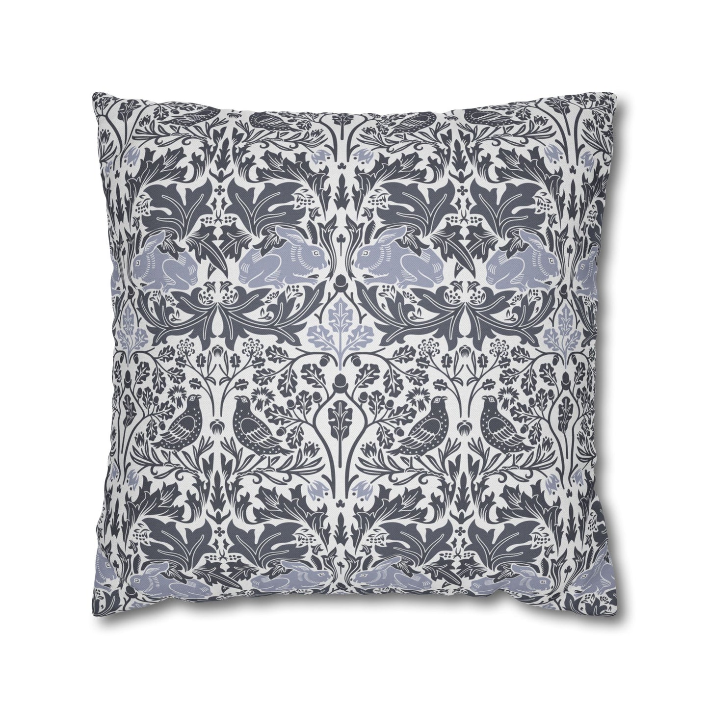 Decorative pillow with floral and bird pattern on a white background