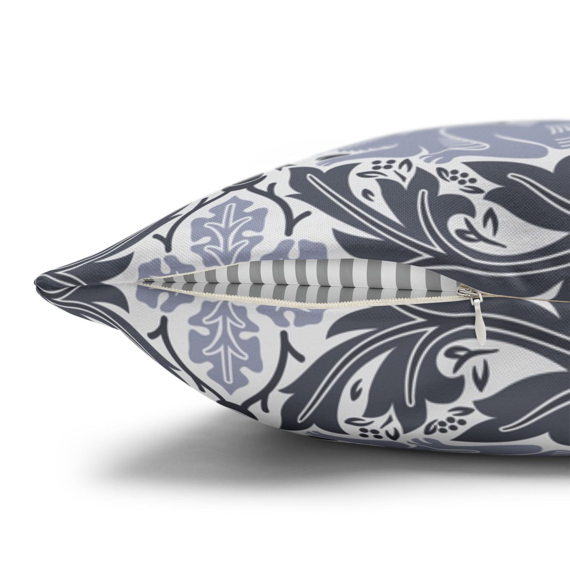 Decorative pillow with floral pattern on a white background