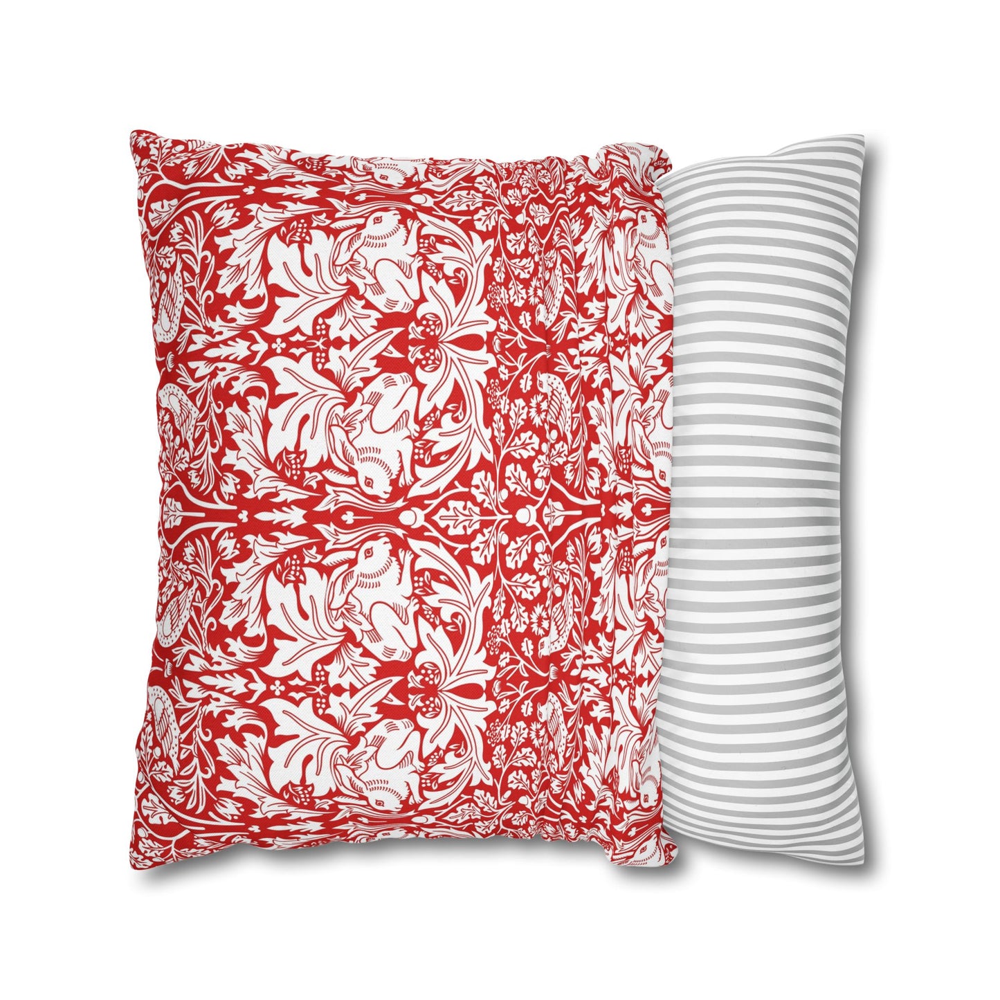 Two pillows, one with red and white pattern and the other with gray stripes, on a white background.