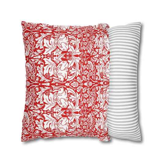 Two pillows, one with red and white pattern and the other with gray stripes, on a white background.