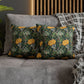 Decorative pillows with floral pattern on a gray sofa