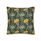 Decorative pillow with floral and vine pattern on a white background