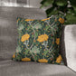 Decorative pillow with floral pattern on a gray sofa