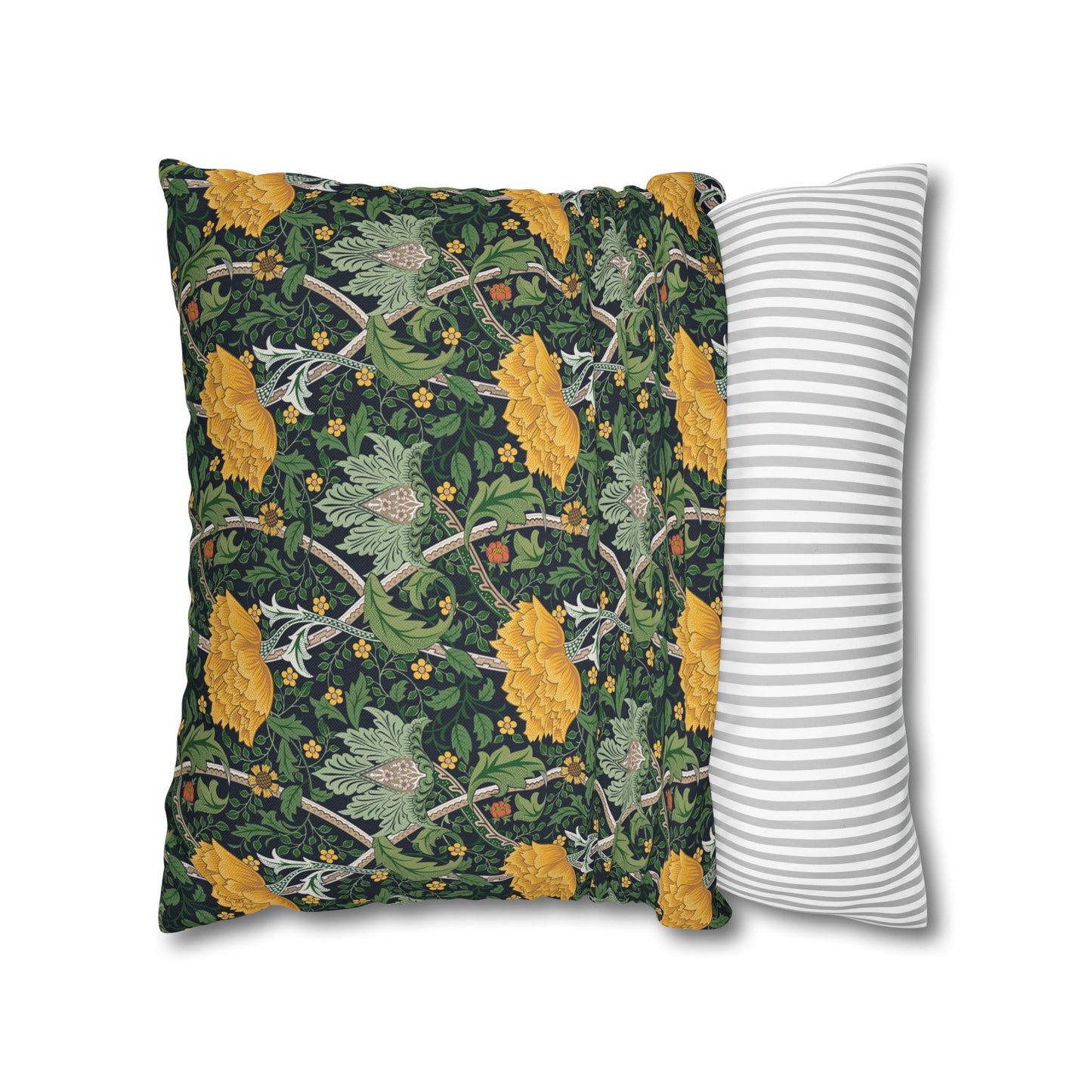 Decorative pillow with floral pattern next to a striped pillow on a white background