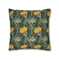 Decorative pillow with floral and vine pattern on a green background