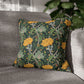 Decorative pillow with floral pattern on a gray sofa