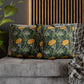 Decorative pillows with floral pattern on a gray sofa