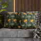 Decorative pillows with floral pattern on a gray sofa